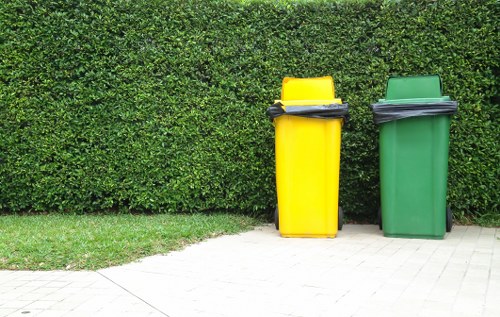 Workers handling poplar waste in a recycling plant